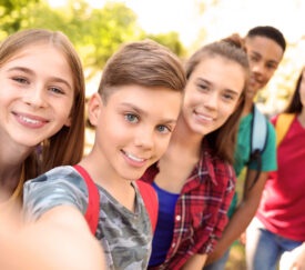 Group,Of,Children,Taking,Selfie,Outdoors.,Summer,Camp